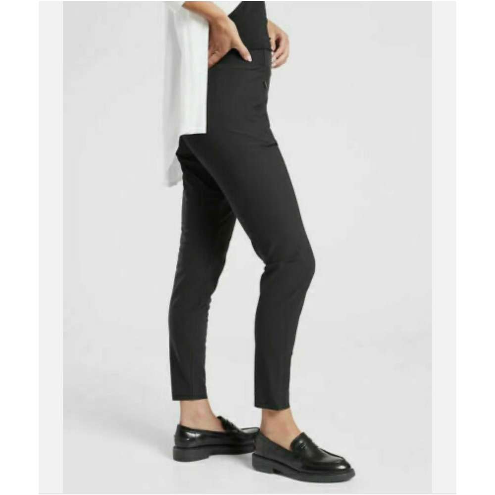 Athleta Stellar Tight Black Zip Hem Ankle Womens size 4 Petite Pockets Travel